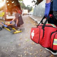 Emergency Medical First aid kit bags of first aid team service for an accident in work of worker loss of function in limbs, First aid training to transfer patient