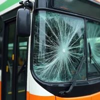 a-shattered-bus-windshield-with-a-central-impact-point